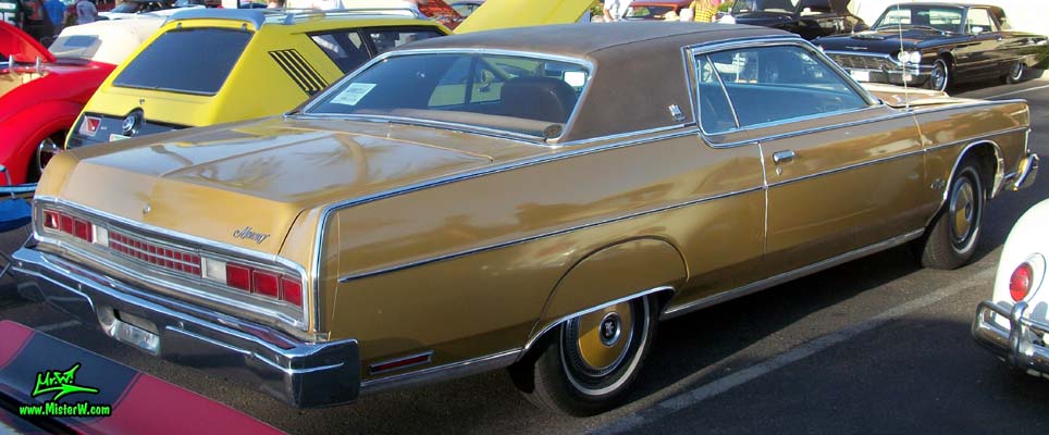 Photo of a gold brown 1973 Mercury 2 door hartop coupe at the Scottsdale Pavilions Classic Car Show in Arizona. Sideview of a 1973 Mercury Hartop Coupe