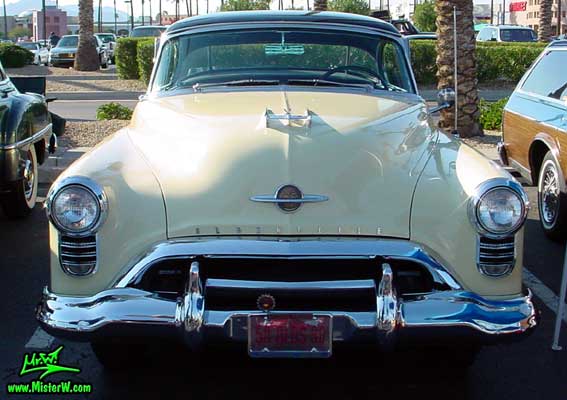 Photo of a white 1950 Oldsmobile 98 2 Door Hardtop Coupe at the Scottsdale Pavilions Classic Car Show in Arizona. 1950 Oldsmobile 98 Frontview