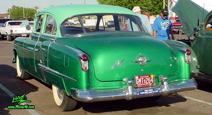 Photo of a green 1952 Oldsmobile 88 4 Door Hardtop Sedan at a Classic Car Meeting in Phoenix, Arizona. 1952 Oldsmobile Sideview