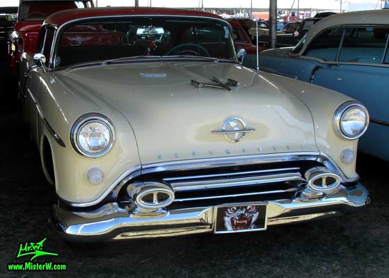 Photo of a white 1954 Oldsmobile 2 Door Hardtop Coupe at a Classic Car Auction in Scottsdale, Arizona. White 1954 Oldsmobile