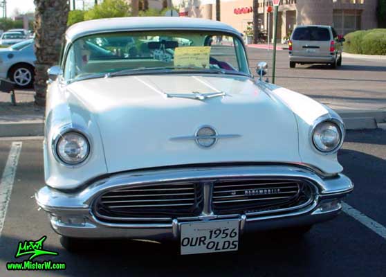 Photo of a white & turkquoise 1956 Oldsmobile 4 Door Hardtop Sedan at the Scottsdale Pavilions Classic Car Show in Arizona. 1956 Oldsmobile