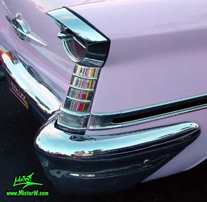 Photo of a pink 1957 Oldsmobile 2 Door Hardtop Coupe at the Scottsdale Pavilions Classic Car Show in Arizona. 1957 Oldsmobile Tail Lights
