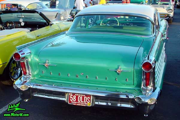 Photo of a green 1958 Oldsmobile 4 Door Hardtop Sedan at a Classic Car Meeting in Arizona. 1958 Oldsmobile 98 Rearview
