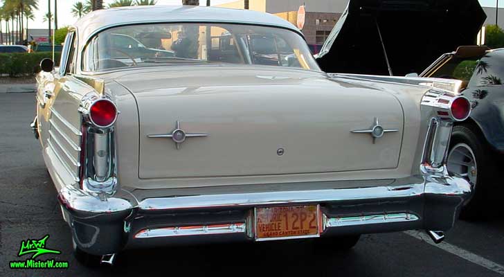 Photo of a beige 1958 Oldsmobile 2 Door Hardtop Coupe at the Scottsdale Pavilions Classic Car Show in Arizona. 1958 Oldsmobile Coupe Rearview