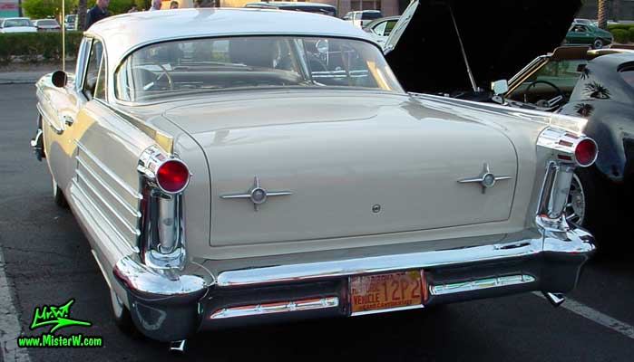 Photo of a beige 1958 Oldsmobile 2 Door Hardtop Coupe at the Scottsdale Pavilions Classic Car Show in Arizona. 1958 Oldsmobile Tail Lights