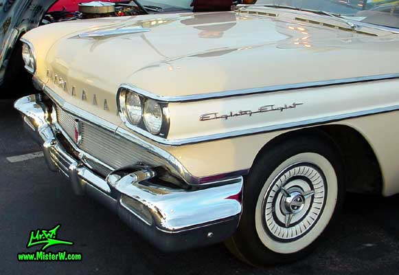 Photo of a beige 1958 Oldsmobile 2 Door Hardtop Coupe at the Scottsdale Pavilions Classic Car Show in Arizona. 58 Olds Eighty Eight Fender Chrome