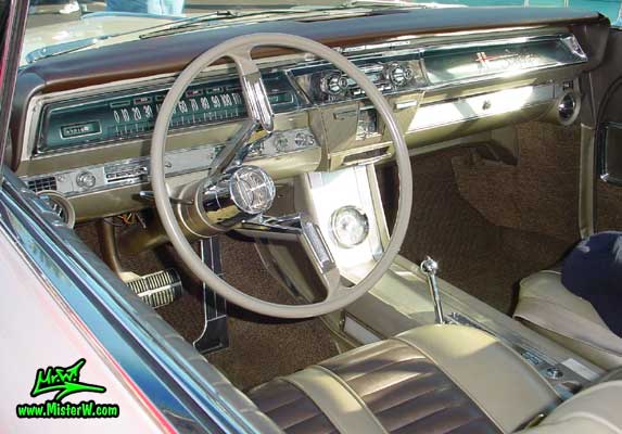 Photo of a white 1962 Oldsmobile Starfire 2 Door Hardtop Coupe at the Scottsdale Pavilions Classic Car Show in Arizona. 1962 Oldsmobile Starfire Dashboard & Interior