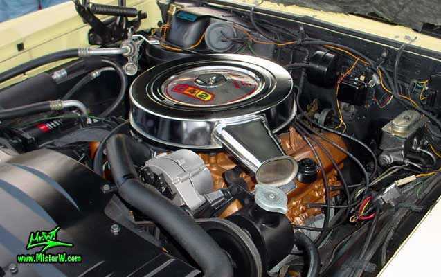 Photo of a yellow 1967 Oldsmobile 2 Door Hardtop Coupe at the Scottsdale Pavilions Classic Car Show in Arizona. 1967 Oldsmobile Engine