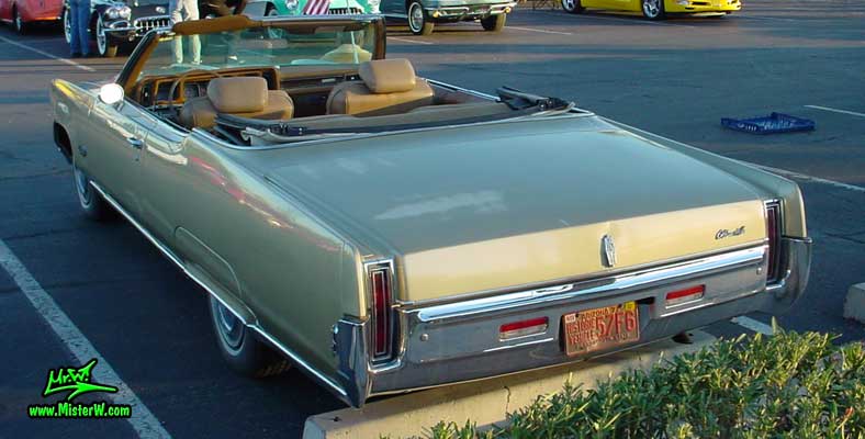 Photo of a gold 1969 Oldsmobile 2 Door Convertible at the Scottsdale Pavilions Classic Car Show in Arizona. 69 Olds Convertible Tail Lights & Bumper