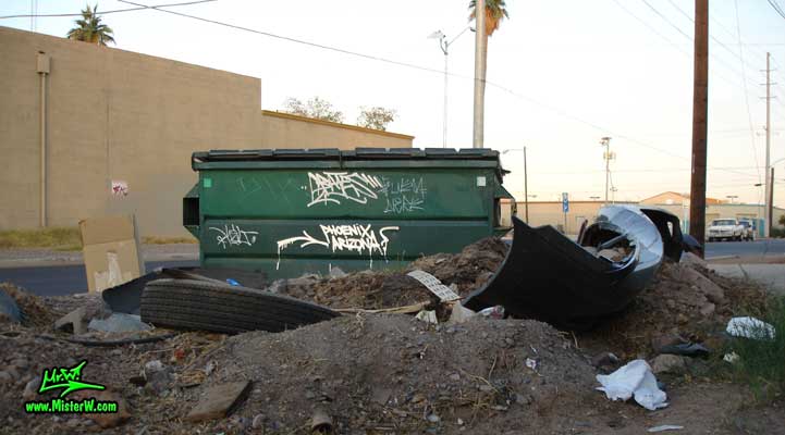 Bates tag on a ghetto dumpster in Phoenix, Arizona