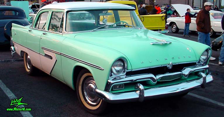 Photo of a white & turquoise 1956 Chrysler Plymouth Belvedere 4 Door Sedan at the Scottsdale Pavilions Classic Car Show in Arizona. 56 Plymouth Belvedere