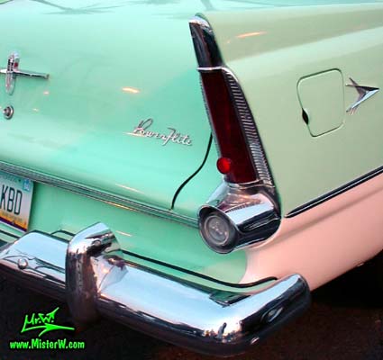 Photo of a white & turquoise 1956 Chrysler Plymouth Belvedere 4 Door Sedan at the Scottsdale Pavilions Classic Car Show in Arizona. Tail Fin of a 56 Plymouth