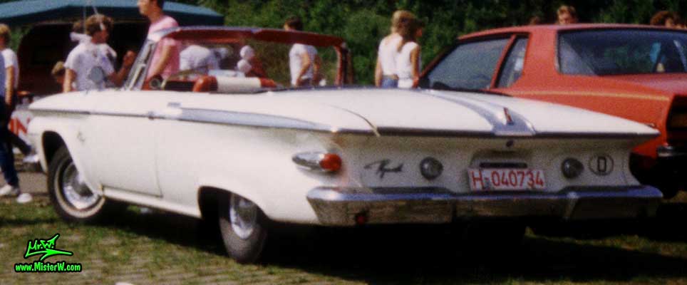 Rearview of a white 1961 Plymouth Fury Convertible