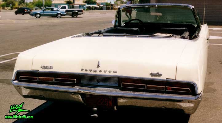 Photo of a white 1967 Chrysler Plymouth Sport Fury Convertible in Sunnyslope, Arizona. Rearview of a 1967 Plymouth Sport Fury Convertible