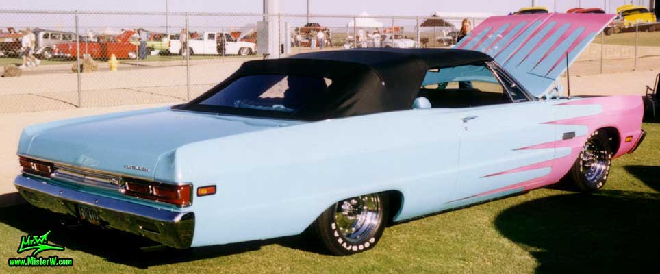 Photo of a blue 1969 Chrysler Plymouth Convertible at a classic car show in Phoenix, Arizona. Rearview of a 1969 Plymouth Convertible