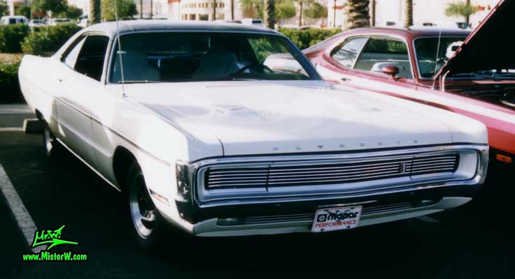 Photo of a white 1970 Chrysler Plymouth 2 Door Hardtop Coupe at the Scottsdale Pavilions Classic Car Show in Arizona. 1970 Plymouth Coupe