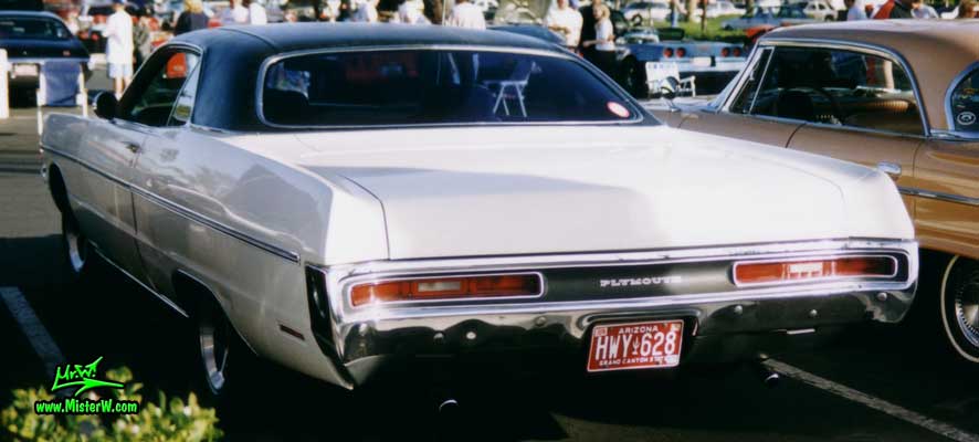 Photo of a white 1970 Chrysler Plymouth 2 Door Hardtop Coupe at the Scottsdale Pavilions Classic Car Show in Arizona. Back of a 1970 Plymouth Coupe