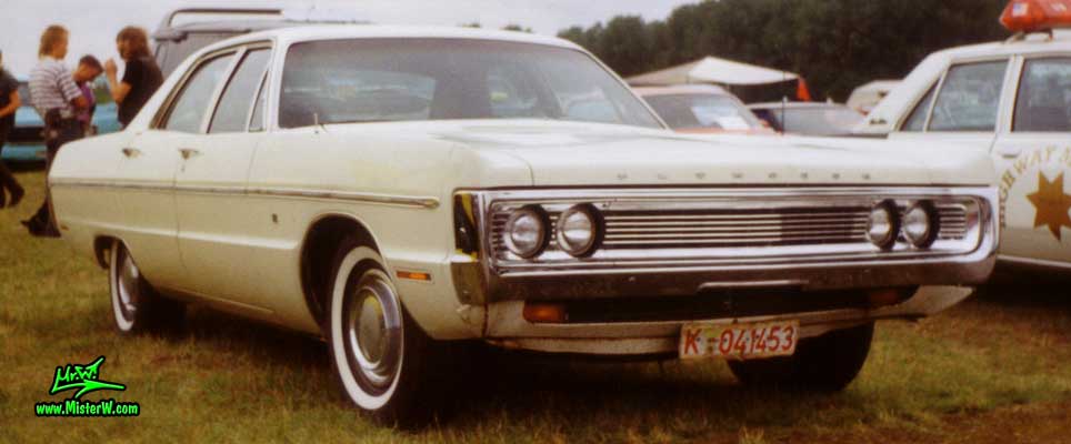 Photo of a white 1970 Chrysler Plymouth 4 Door Hardtop Sedan at a classic car meeting in Germany. Front of a 1970 Plymouth Sedan