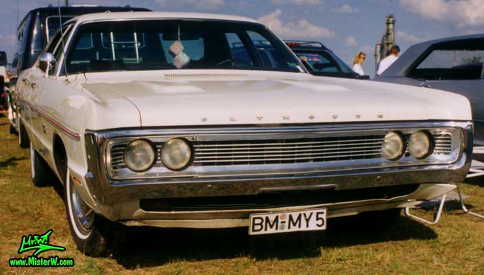 Frontview of a white 1970 Plymouth Sedan