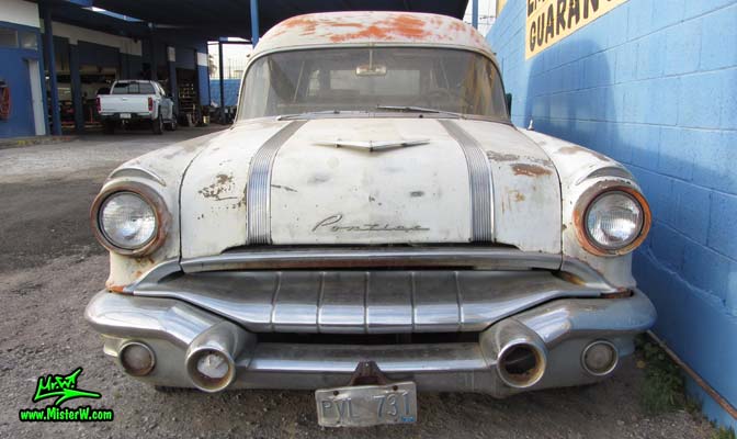 Photo of a grey primered 1956 Pontiac ambulance in Phoenix, Arizona. Front view of a 56 Pontiac Ambulance Wagon