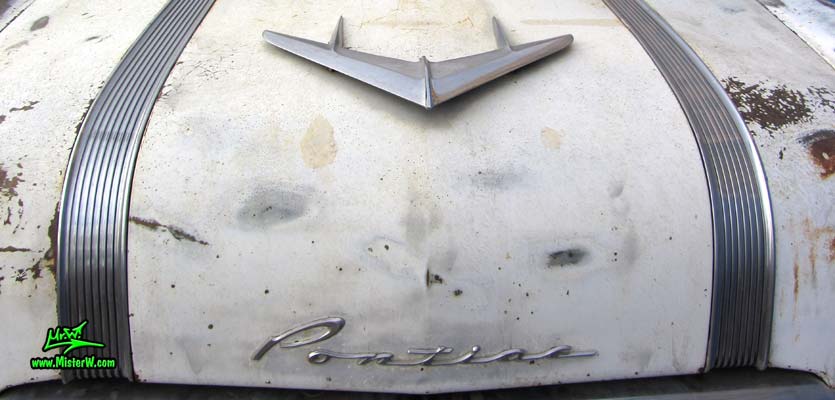 Photo of a grey primered 1956 Pontiac ambulance in Phoenix, Arizona. Hood of a 56 Pontiac Ambulance Wagon