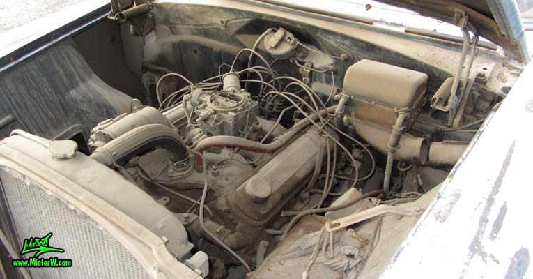 Photo of a grey primered 1956 Pontiac ambulance in Phoenix, Arizona. Motor compartment of a 56 Pontiac Ambulance Wagon