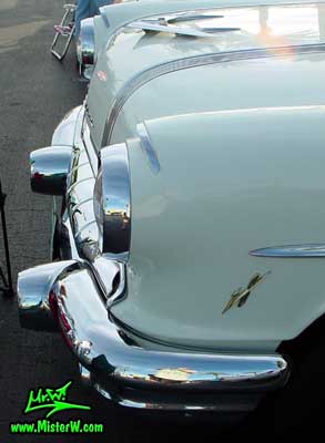 Photo of a jade & white 1956 Pontiac 2 Door Hardtop Coupe at the Scottsdale Pavilions Classic Car Show in Arizona. 1956 Pontiac Hood Ornament & Chrome