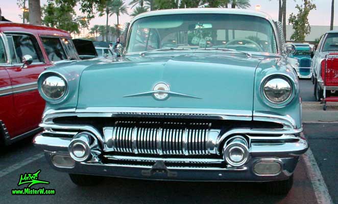 Photo of a blue 1957 Pontiac 2 Door Hardtop Coupe at the Scottsdale Pavilions Classic Car Show in Arizona. 57 Pontiac