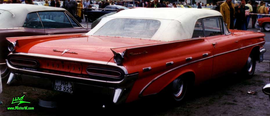 Photo of a red 1959 Pontiac Bonneville 2 Door Convertible at a Classic Car Meeting in Germany. 59 Pontiac Bonneville Convertible Sideview