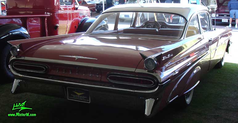 Photo of a pink 1959 Pontiac Star Chief 2 Door Hardtop Coupe at a Classic Car Auction in Scottsdale, Arizona. 1959 Pontiac Star Chief Sideview