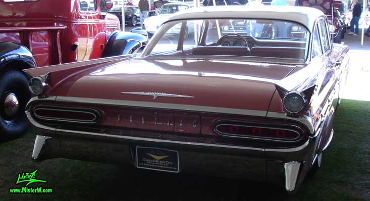 Photo of a pink 1959 Pontiac Star Chief 2 Door Hardtop Coupe at a Classic Car Auction in Scottsdale, Arizona. 1959 Pontiac Star Chief Rearview