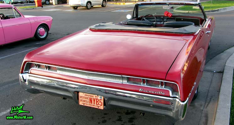 Photo of a red 1967 Pontiac Bonneville Convertible at the Scottsdale Pavilions Classic Car Show in Arizona. 1967 Pontiac Bonneville Convertible Rear Tail Lights