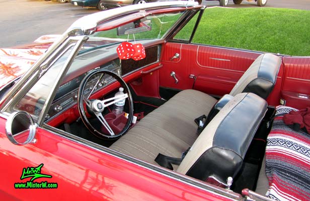 Photo of a red 1967 Pontiac Bonneville Convertible at the Scottsdale Pavilions Classic Car Show in Arizona. 1967 Pontiac Bonneville Front Seats & Dash Board