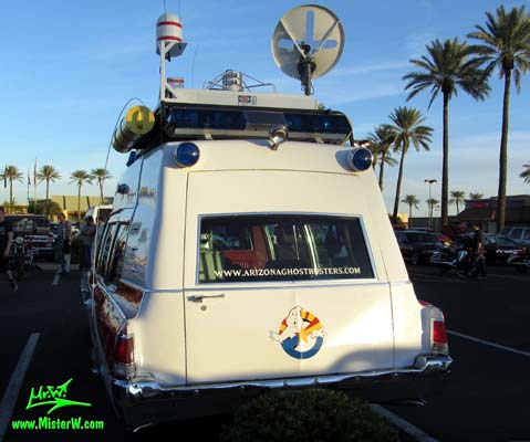 Photo of a red & white Pontiac Bonneville Ambulance at the Scottsdale Pavilions Classic Car Show in Arizona. Rearview of a 72 Pontiac Pontiac Bonneville Ambulance
