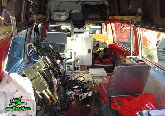 Photo of a red & white Pontiac Bonneville Ambulance at the Scottsdale Pavilions Classic Car Show in Arizona. Interior with Equipment of a 72 Pontiac Pontiac Bonneville Ambulance